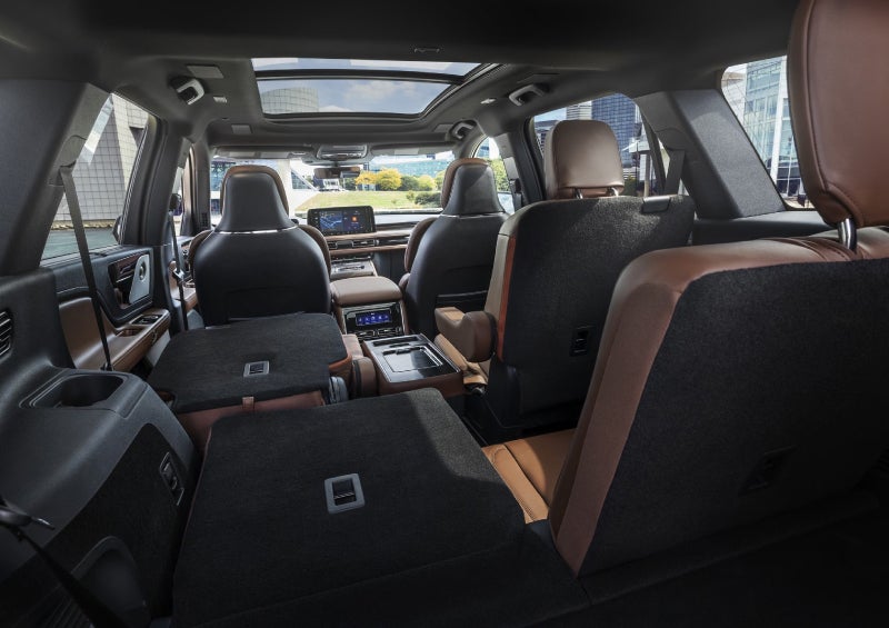 One side of the PowerFold® third-row seat and a second-row seat are folded forward in the 2026 Lincoln Aviator® SUV. | Deacon Jones Lincoln in Goldsboro NC