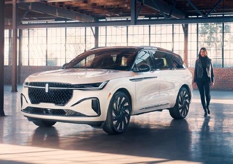 A person approaches a 2026 Lincoln Nautilus® SUV. | Deacon Jones Lincoln in Goldsboro NC