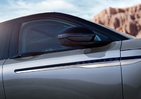 Blue lettering on the side of the vehicle that reads Nautilus indicates the available Hybrid Powertrain. | Deacon Jones Lincoln in Goldsboro NC