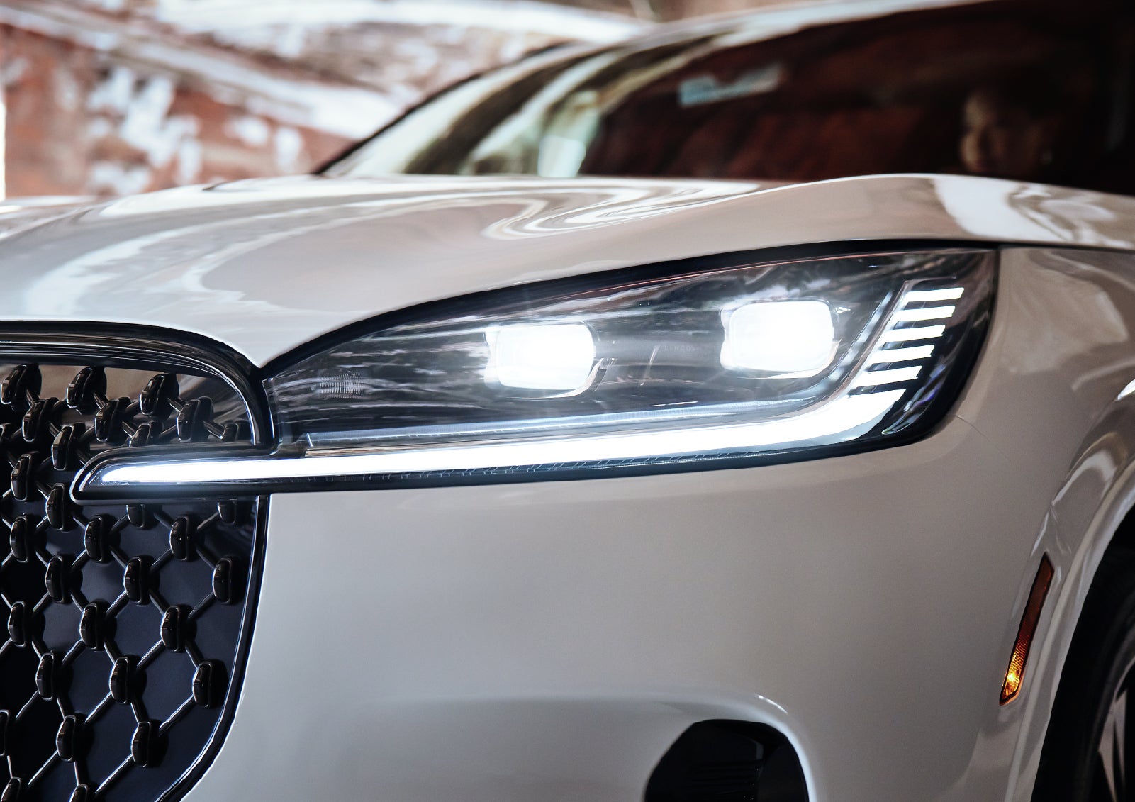 A close-up of a headlamp on the 2027 Lincoln Aviator® SUV is shown. | Deacon Jones Lincoln in Goldsboro NC