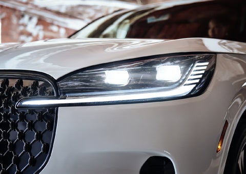 A close-up of a headlamp on the 2027 Lincoln Aviator® SUV is shown. | Deacon Jones Lincoln in Goldsboro NC